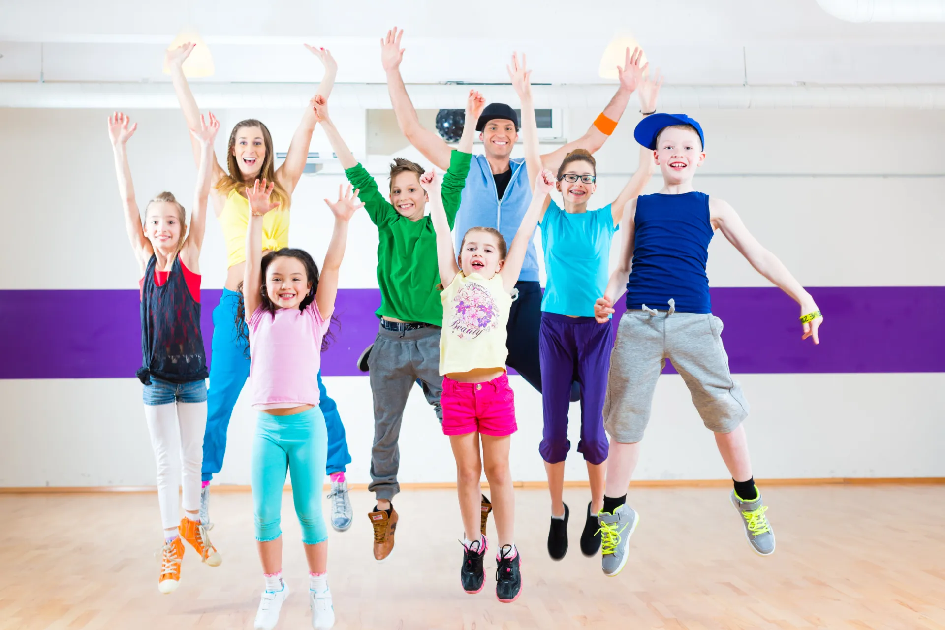 16283966 dance teacher giving kids zumba fitness class