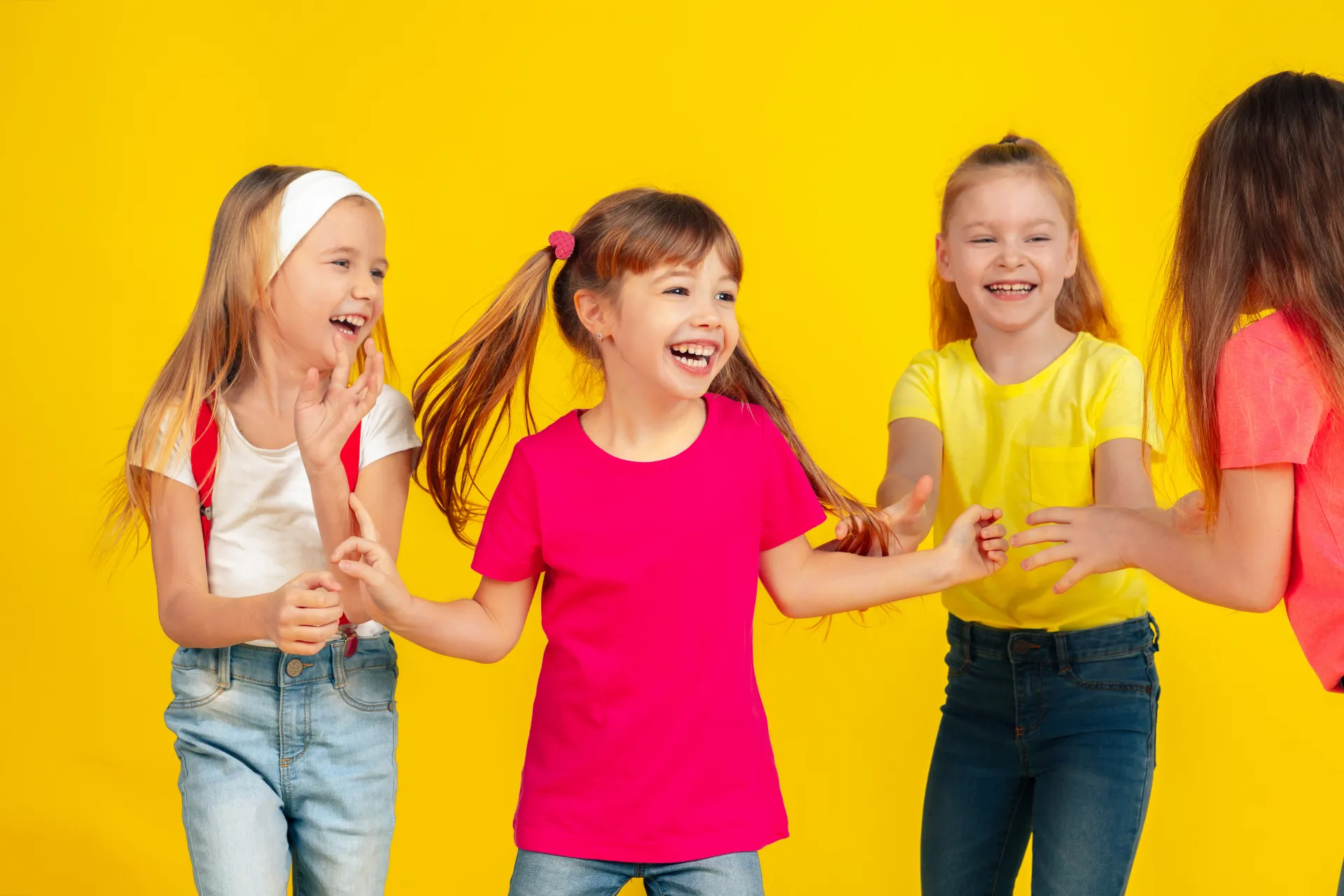 36385566 happy children playing and having fun together on yellow3
