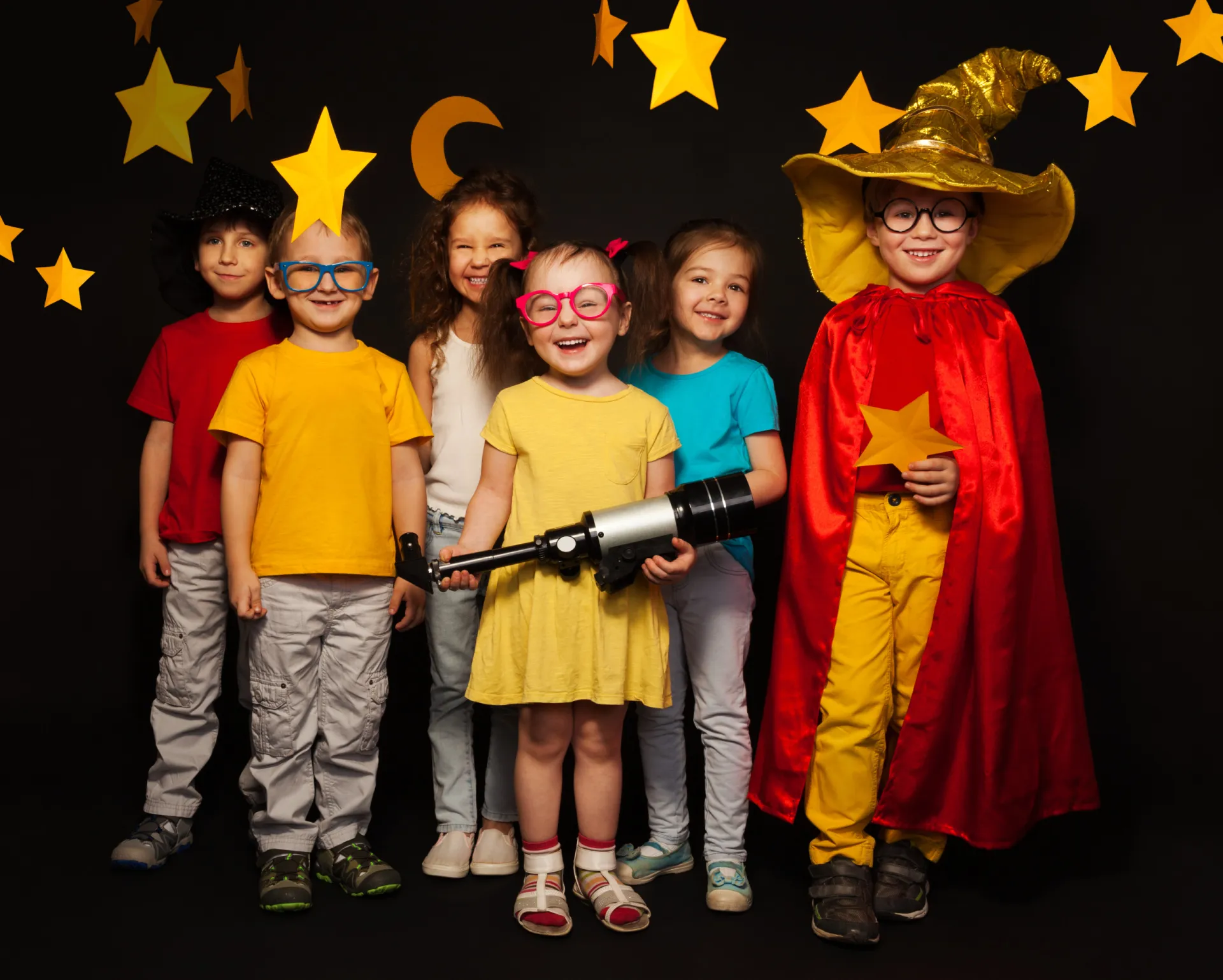 mp16525108 six kids in stargazers costumes with telescope
