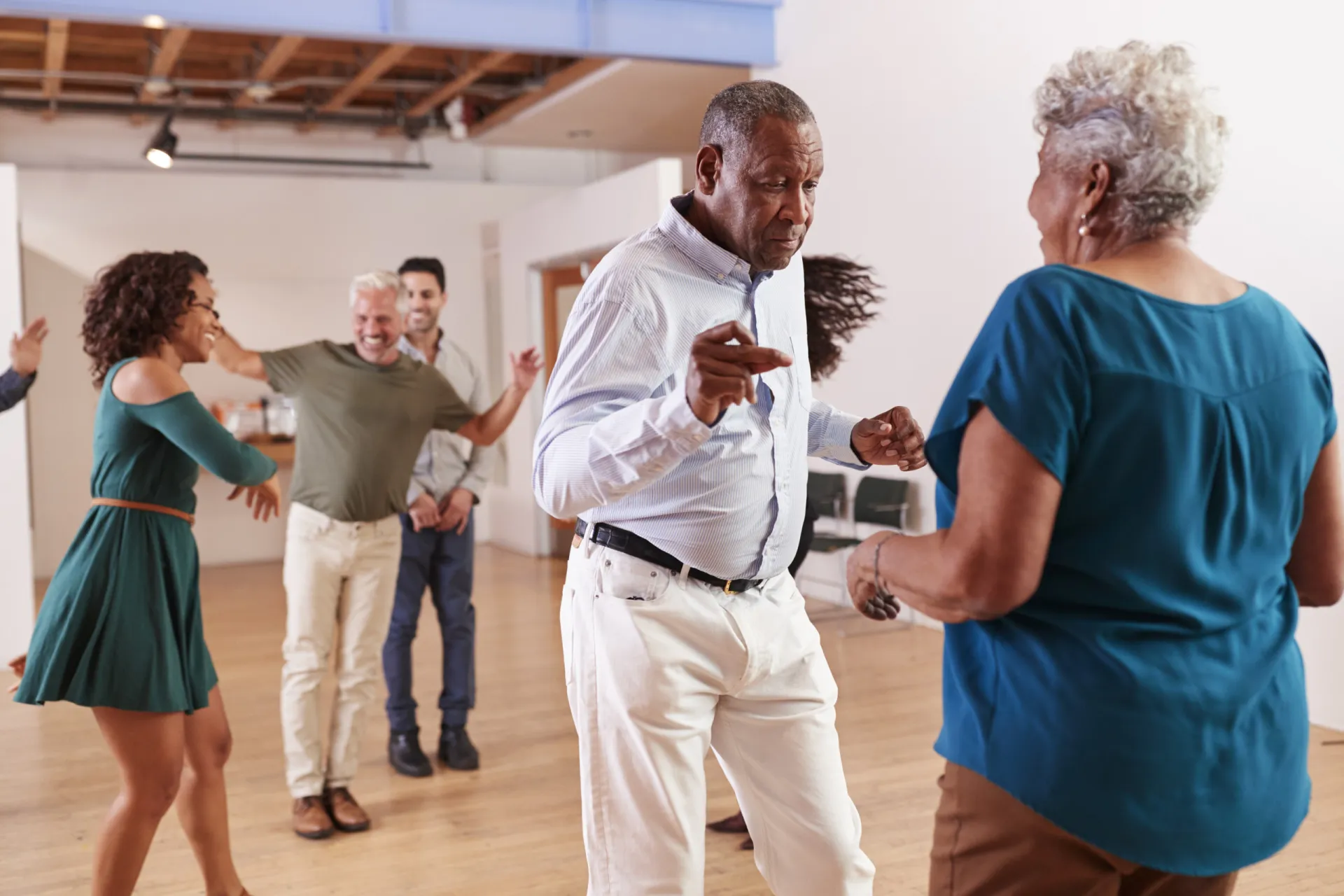 mp32771911 people attending dance class in community center