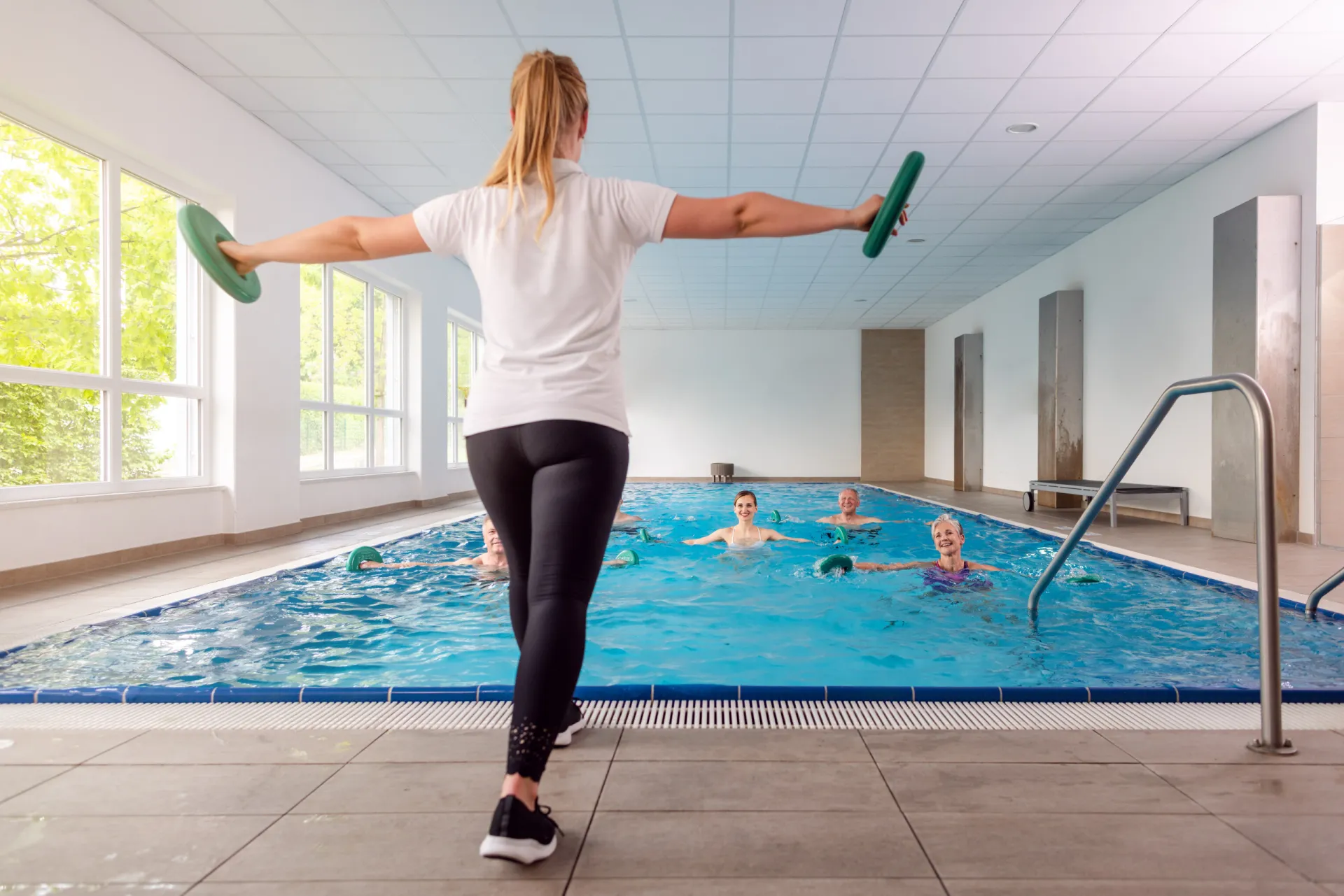 mp62913355 training class in water gymnastics at a rehabilitation gym