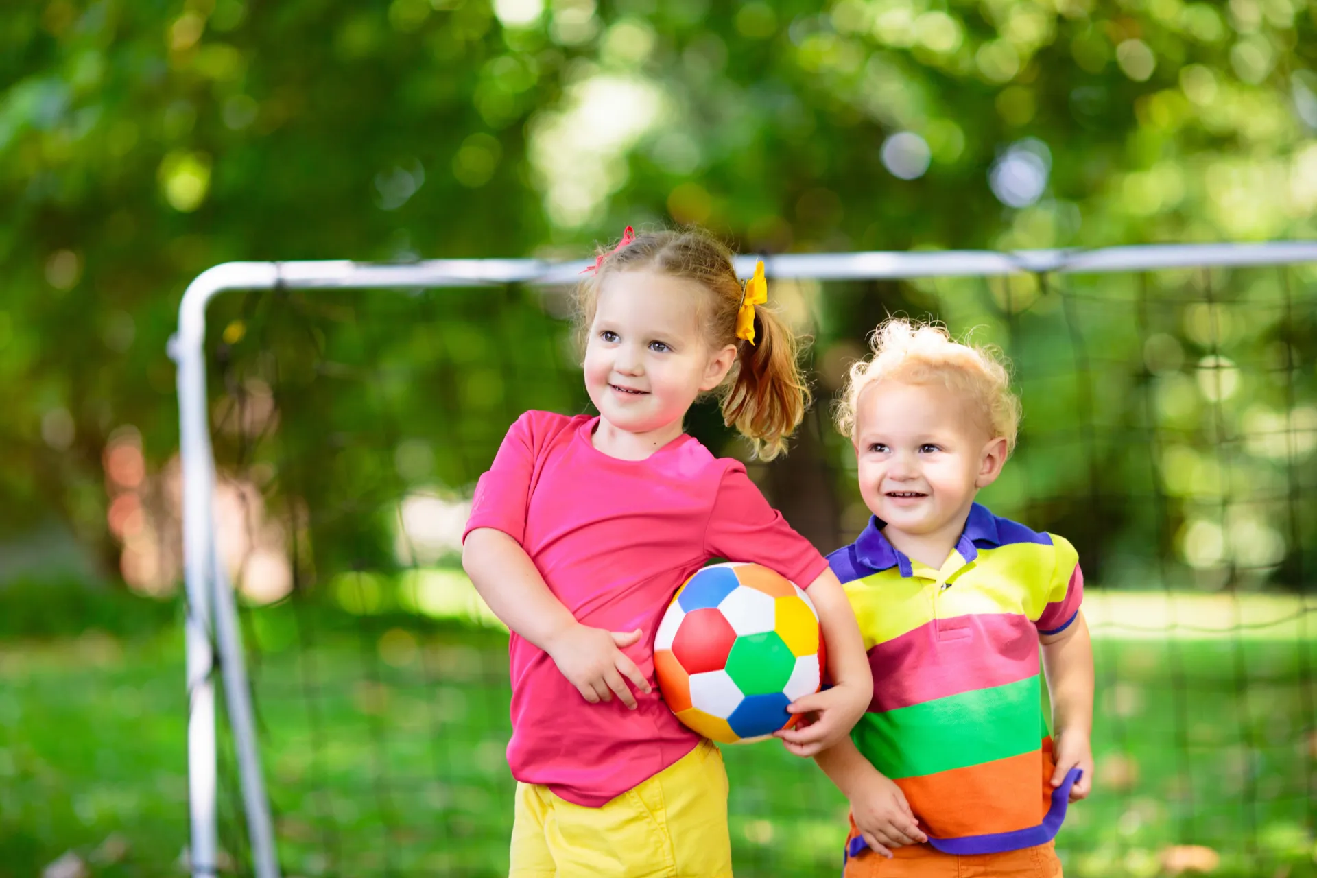 mp65029077 kids play football child at soccer field
